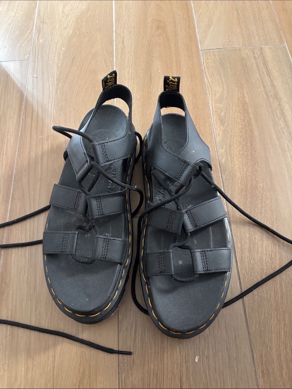 Dr. Martens Black Leather Lace-Up Fisherman Sandals with Yellow Stitching